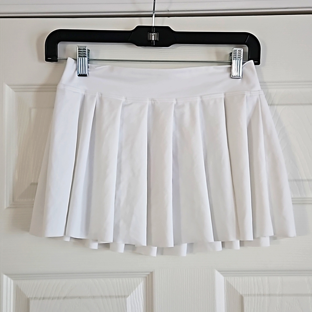 White pleated skirt